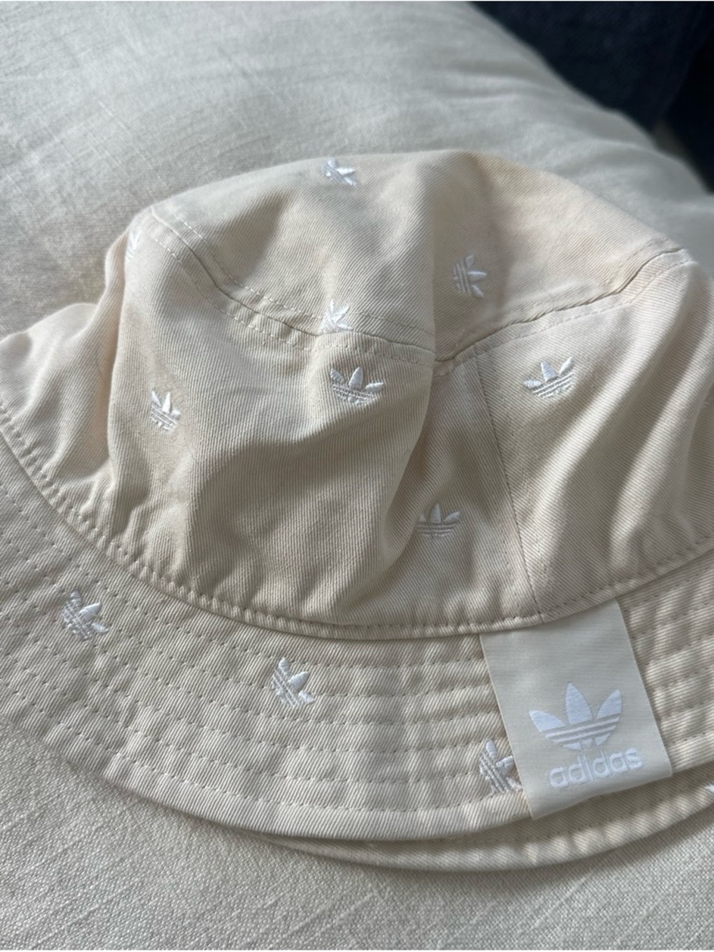 adidas cream bucket hat with white trefoil embroidery